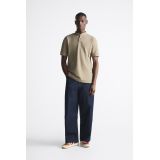Zara Band collar shirt with front button closure and short sleeves. Side vents at hem.