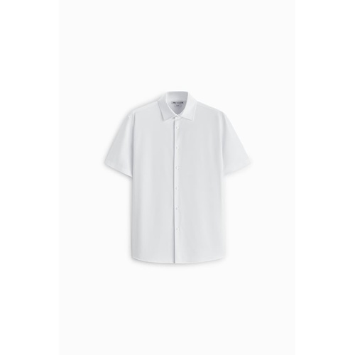 자라 Zara Regular fit shirt made of wrinkle resistant high stretch fabric. Lapel collar and short sleeves. Front button closure.